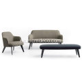 Sillón Jane de tela poliforme de estilo moderno